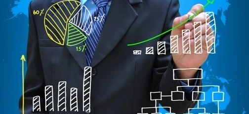 A white-collar worker in formal wear with a necktie, planning business strategies and analyzing graphic designs for a management job.